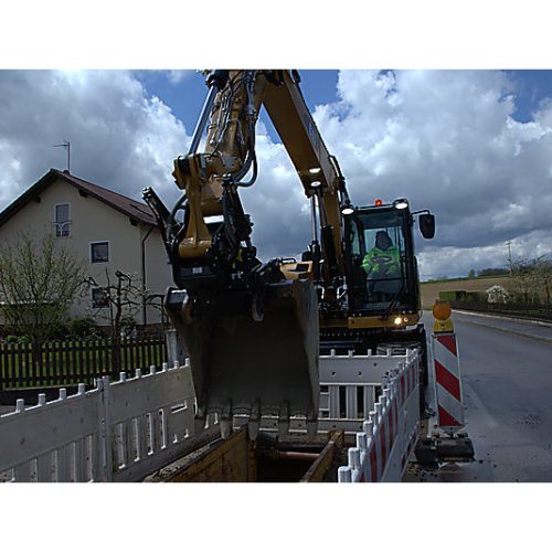 Wheel Excavator CAT M315F jobsite work with bucket