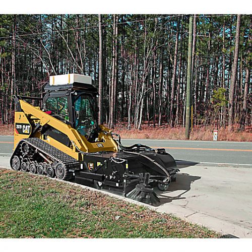 Pickup Brooms BP118C for compact loaders (226 / 249 / 259 /262) in action with excavator
