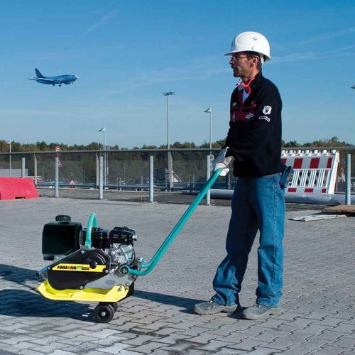 Vibratory plate AMMANN (69 kg) at work